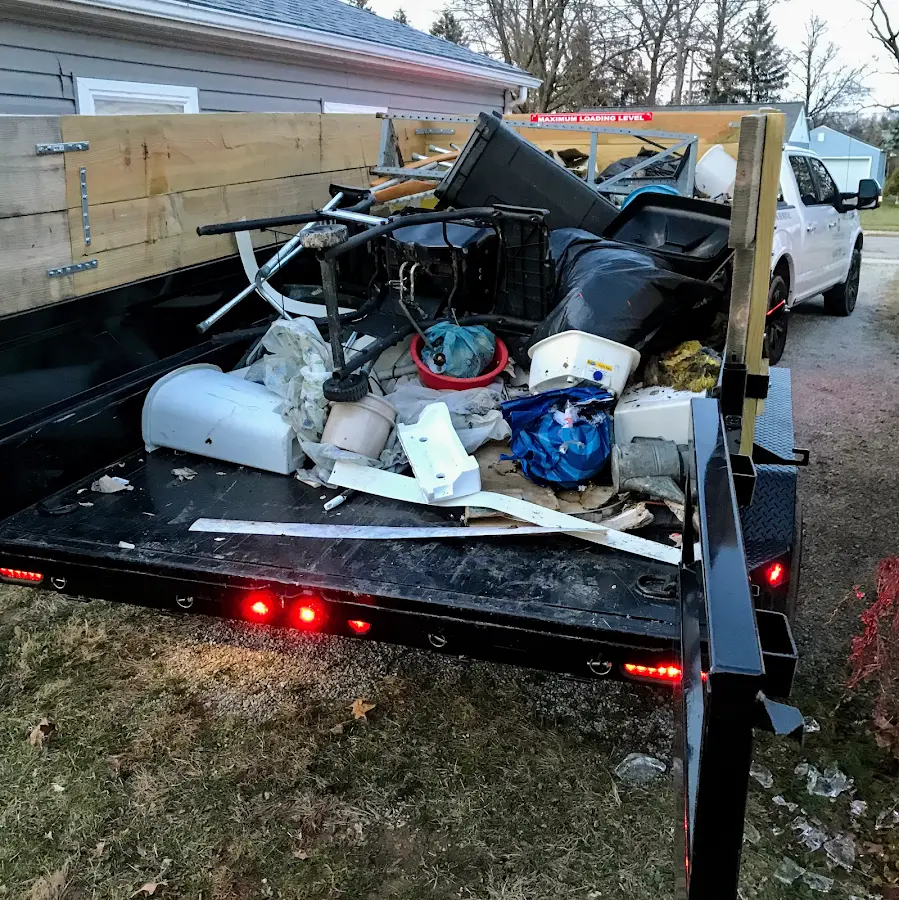 Roll-off dumpster delivered to a residential driveway in Concord